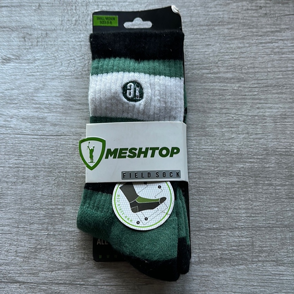 Never opened or worn adrenaline lacrosse socks in size S/M (sizes 5-8.)